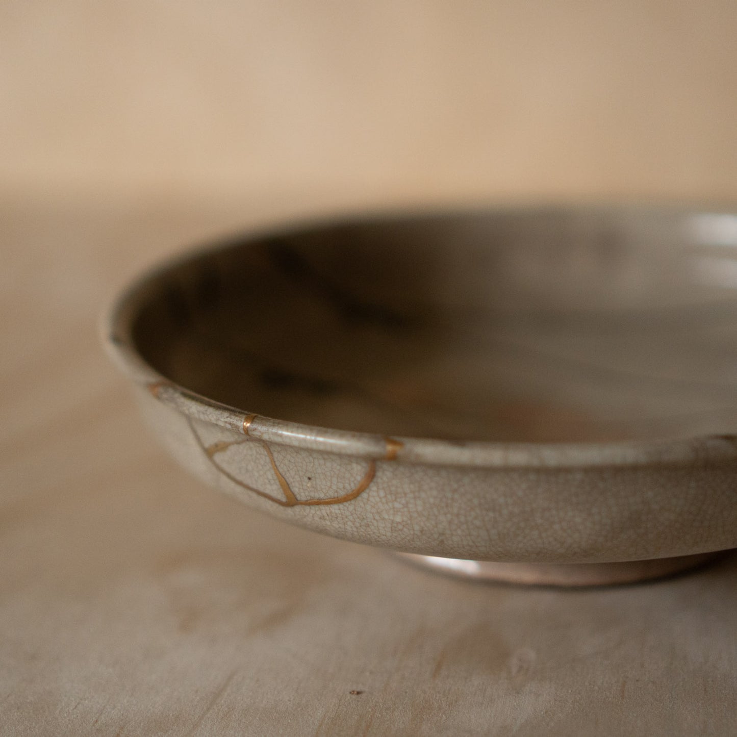 Vintage Japanese Karatsu ceramic serving platter with kintsugi gold repair
