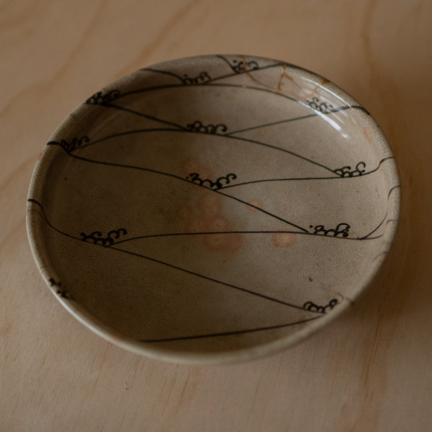 Vintage Japanese Karatsu ceramic serving platter with kintsugi gold repair