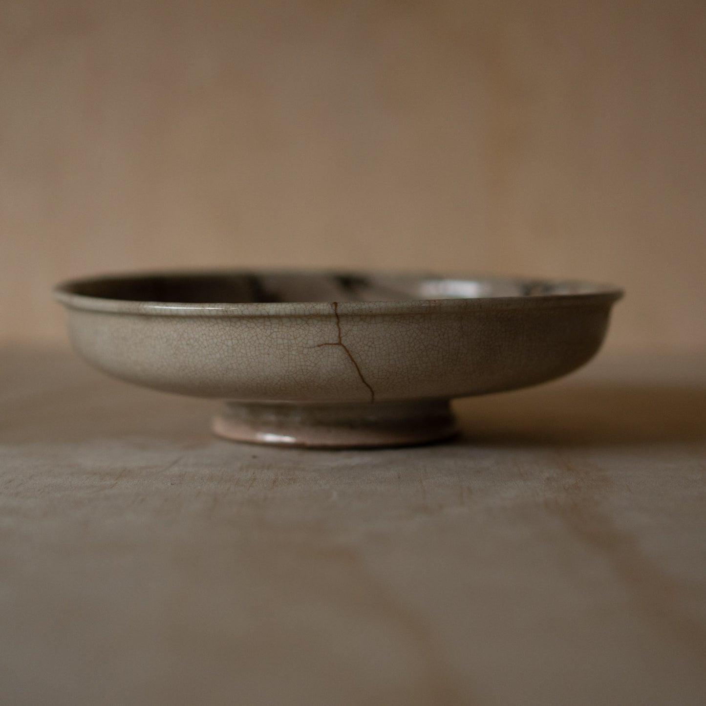 Vintage Japanese Karatsu ceramic serving platter with kintsugi gold repair