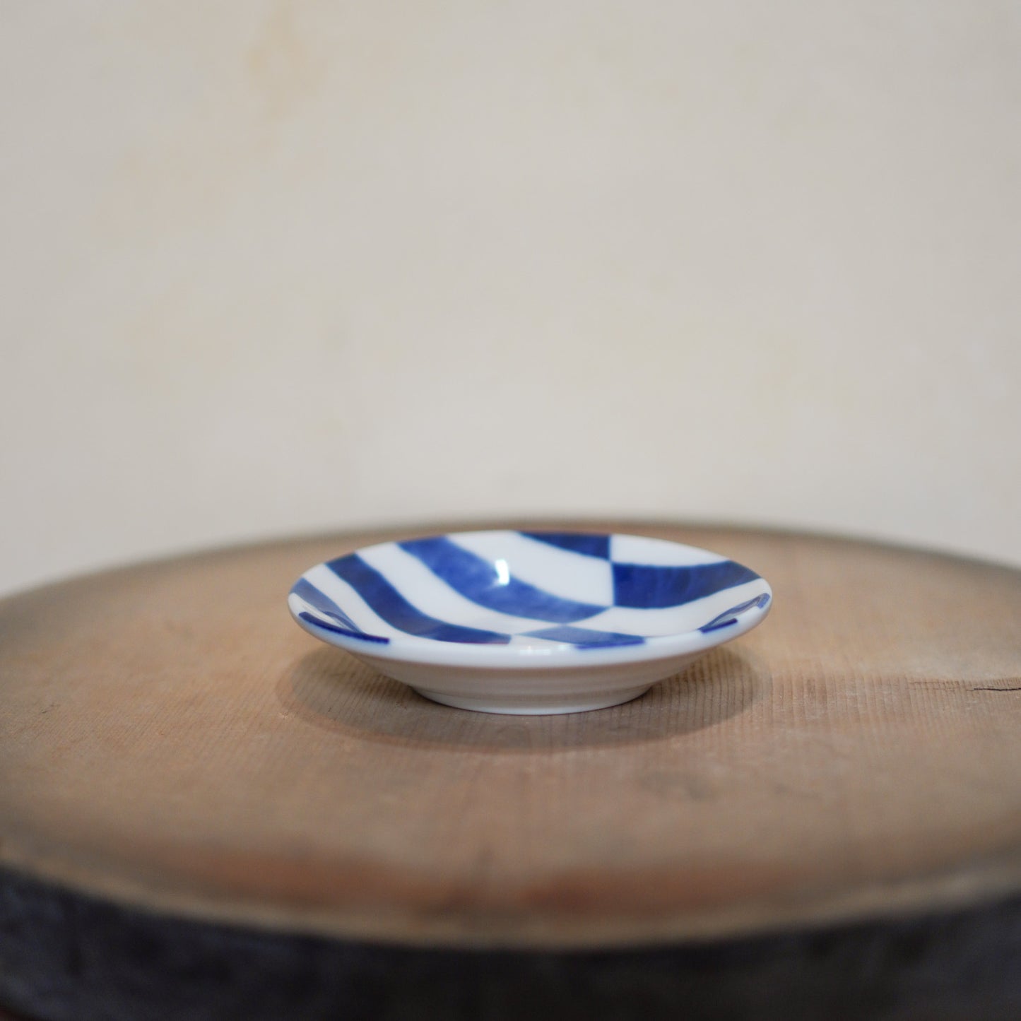 Vintage Japanese ceramic soy sauce dish - blue and white check
