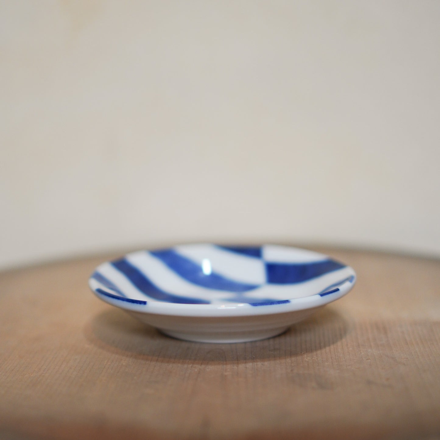 Vintage Japanese ceramic soy sauce dish - blue and white check