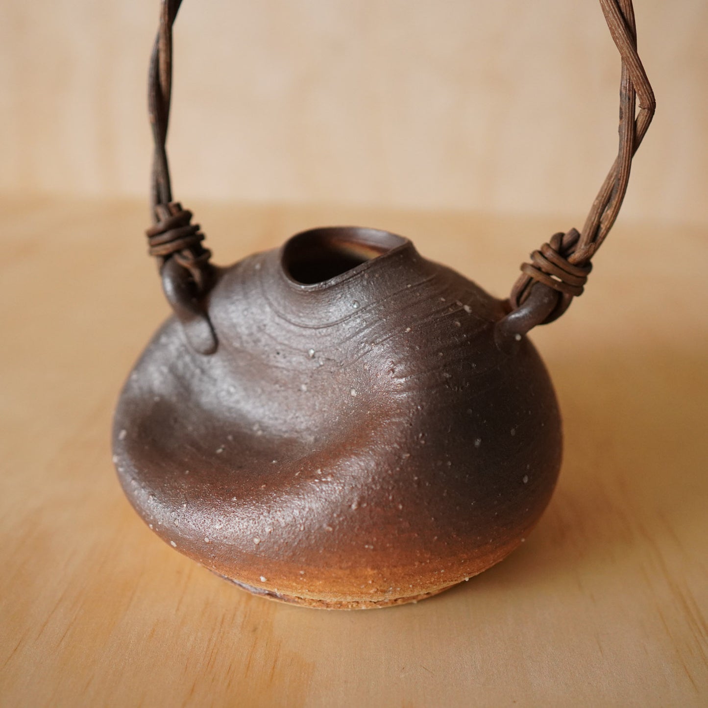 Vintage Japanese Slumped Ceramic Ikebana vase with vine handle