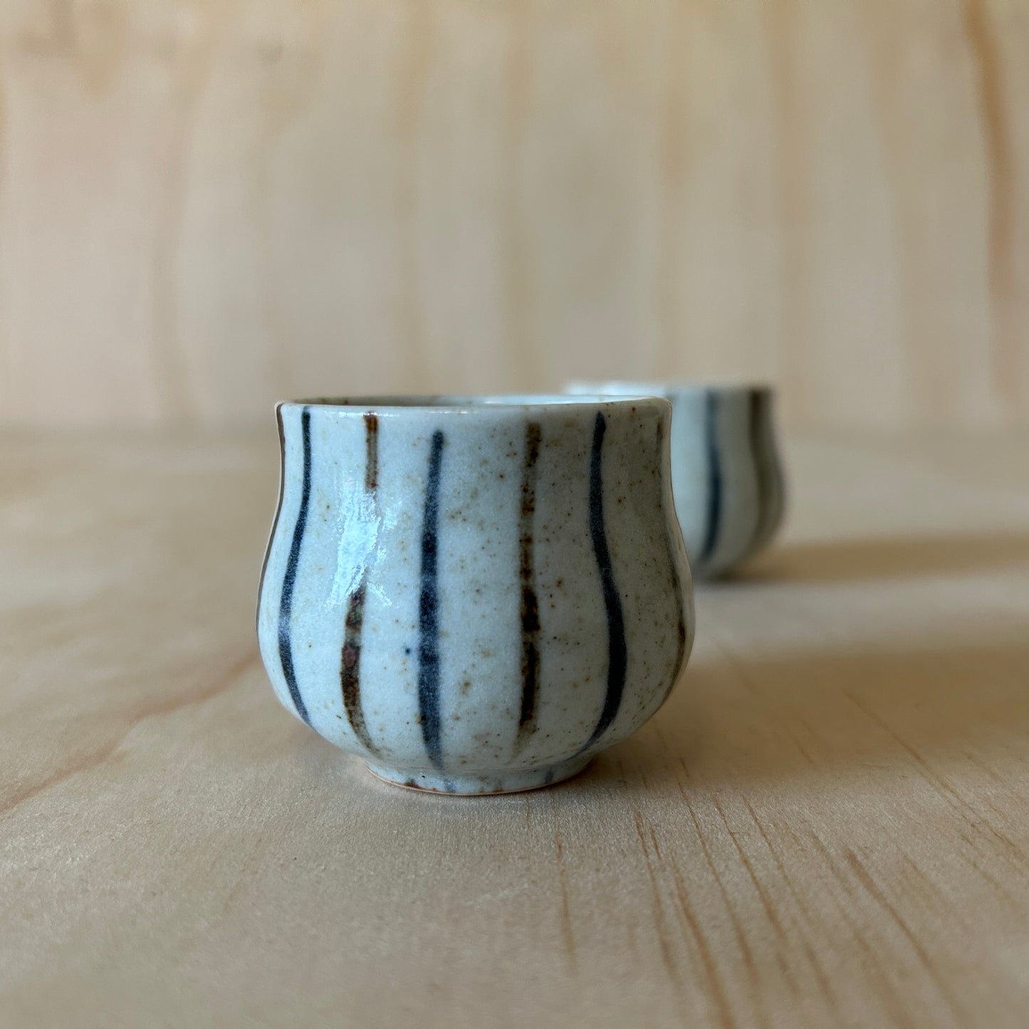 Vintage Japanese off white speckled and striped Ceramic Sake Cups Pair
