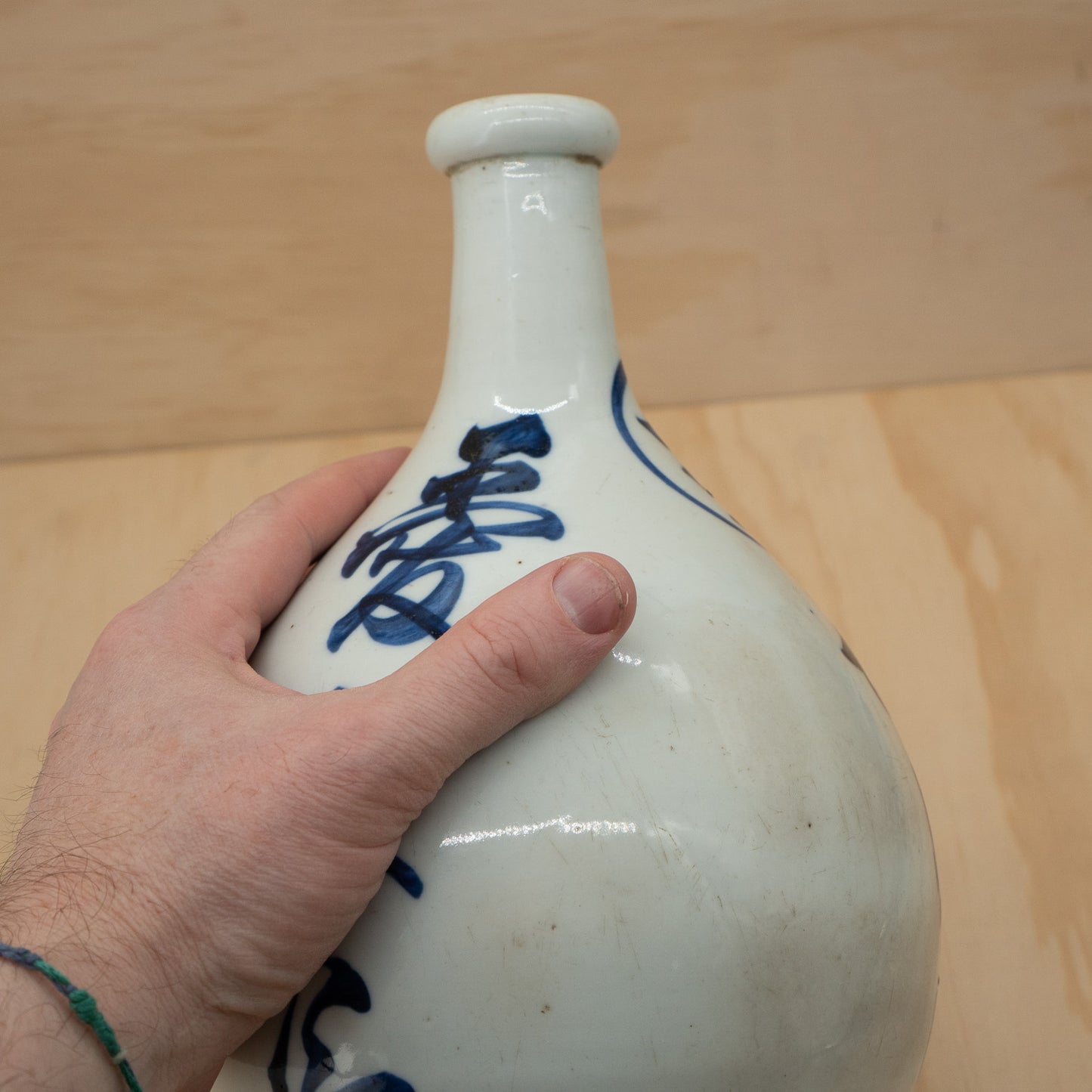 Antique Japanese sake bottle - white with blue kanji
