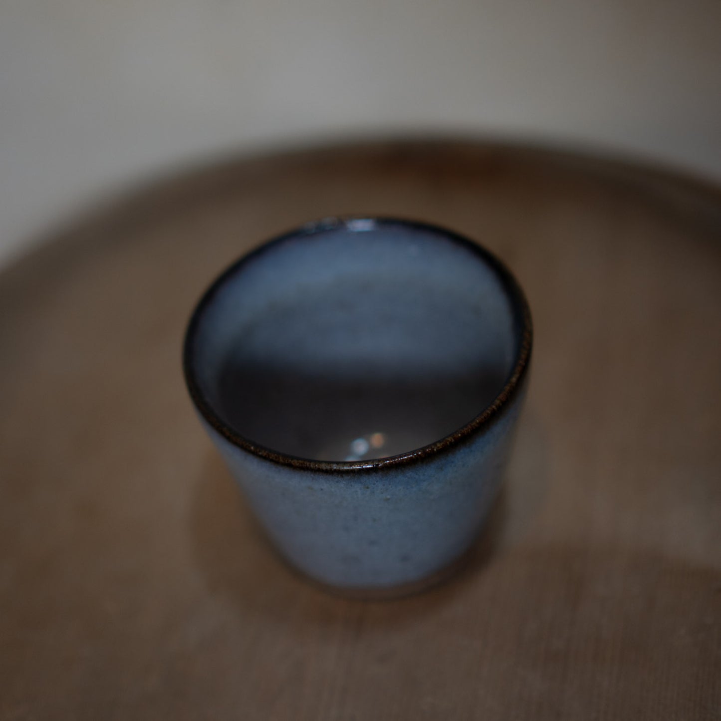 Vintage Japanese ceramic tea cup - blue grey with dark rim