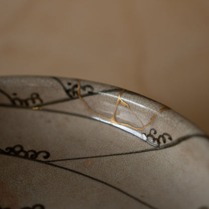 Vintage Japanese Karatsu ceramic serving platter with kintsugi gold repair