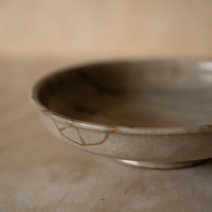 Vintage Japanese Karatsu ceramic serving platter with kintsugi gold repair