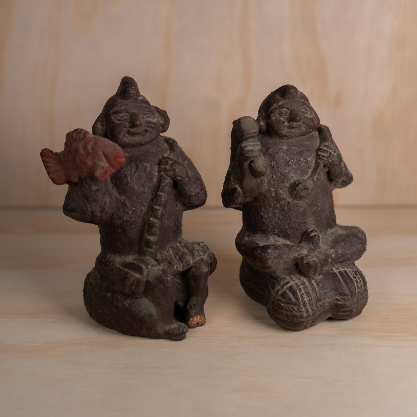 Vintage Japanese ceramic Daikoku and Ebisu figures pair