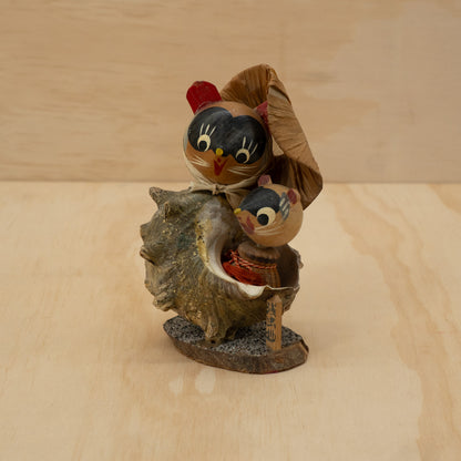 Vintage Japanese folk figure tanuki's in a shell
