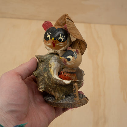 Vintage Japanese folk figure tanuki's in a shell