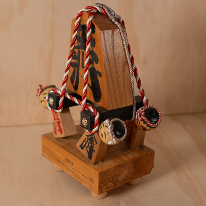 Vintage Japanese Folk Art Sculpture - Kokeshi holding giant Shogi Chess piece