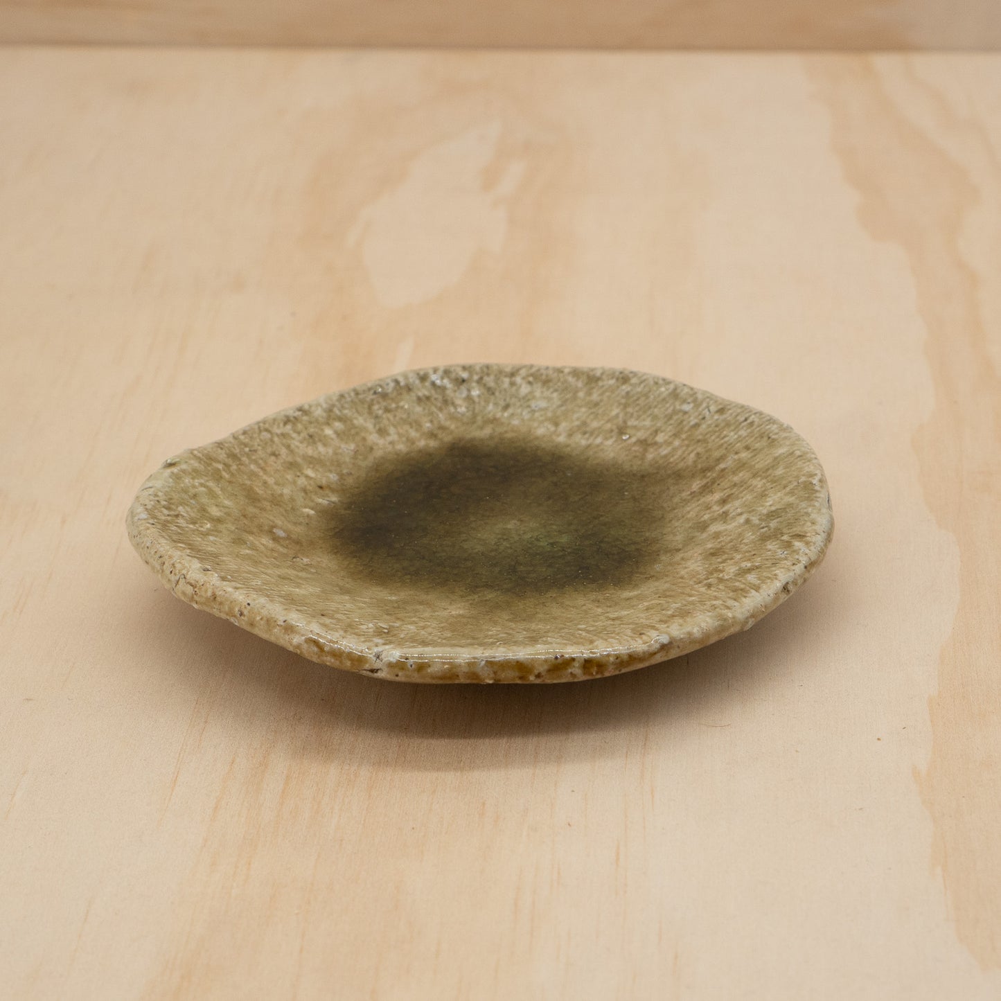 Vintage Japanese hand made green glazed small plate