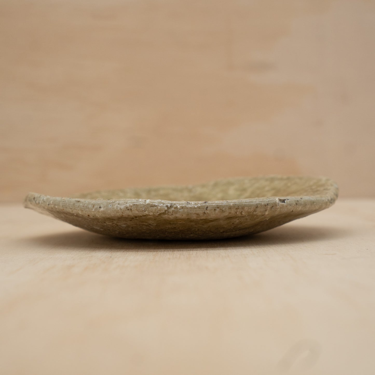 Vintage Japanese hand made green glazed small plate